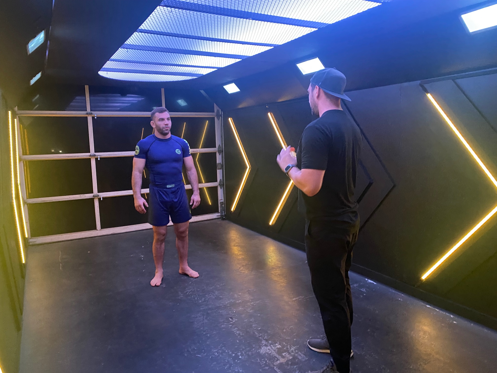 Wide behind-the-scenes view of the illuminated studio set