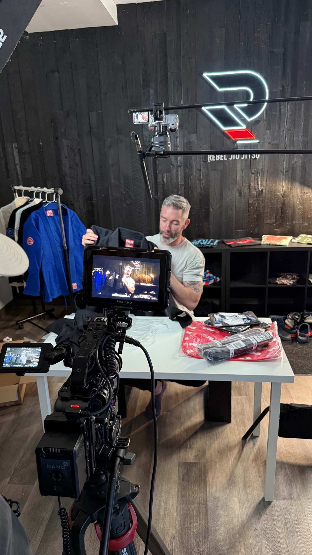 Close-up behind the monitor at Rebel Jiu Jitsu product detail shoot